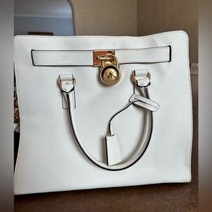 Michael Kors White bag.